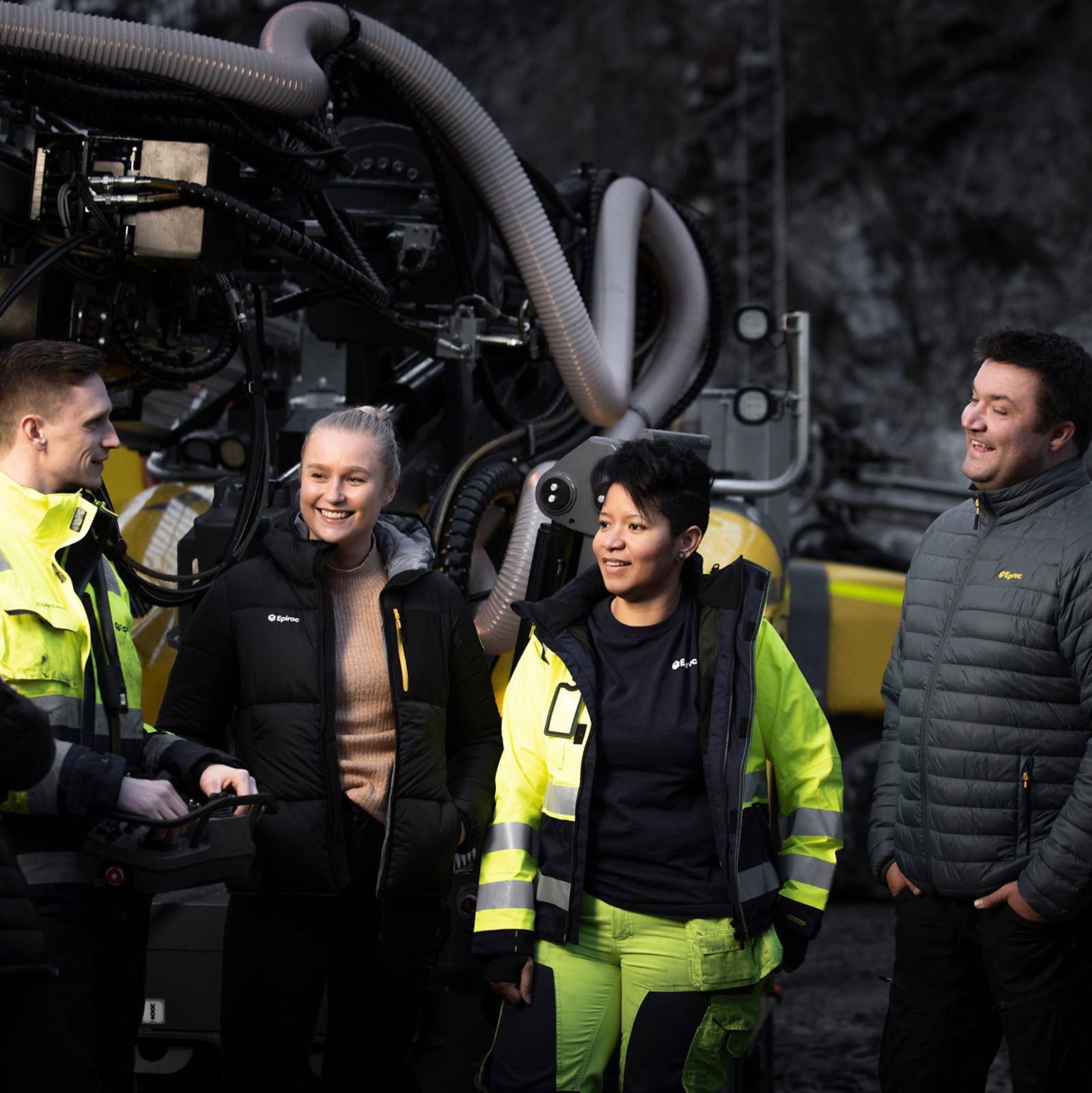 Epiroc team with machine in background