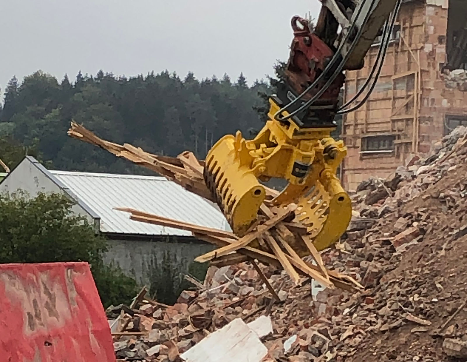 Demolition with excavator attachments | Epiroc US
